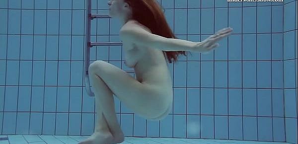  Pink swimswear babe Lera showing naked body underwater